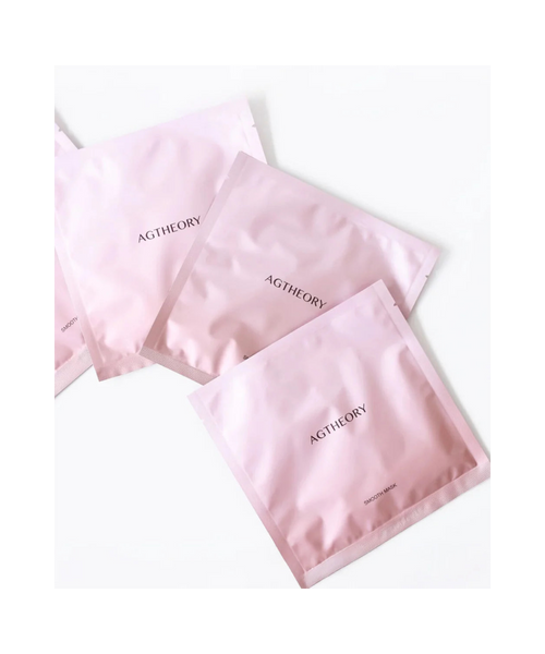 AXXZIA AGTheory Smooth Face Mask – różowe saszetki z maskami na szarym tle, eleganckie opakowanie premium